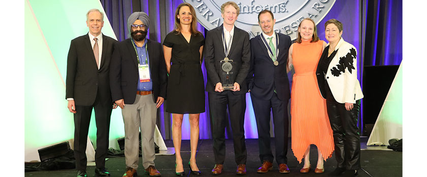 USA Cycling wins the 2025 Franz Edelman Award during the Edelman Gala at the 2025 INFORMS Analytics+ Conference in Indianapolis.
