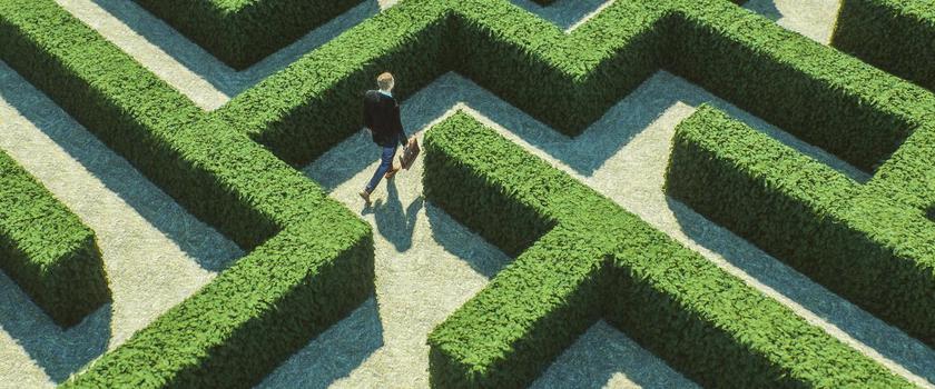 man in maze looking for way out