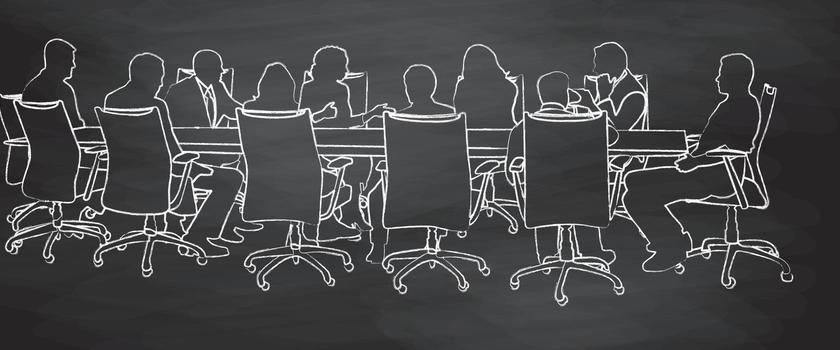 group of people at a conference table