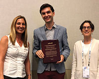 Committee chair Amber Puha, Mykhaylo Shkolnikov and APS President Amy Ward (l-r).