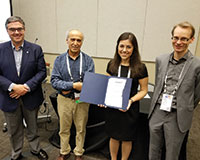 Miguel Anjos (ENRE president-elect), Hayri Onal (ENRE president), Beste Basciftci (winner) and Boris Defourny (committee chair) (l-r).