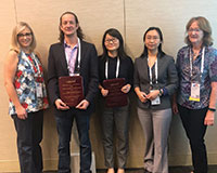 HAS President Lisa Maillart, winners Jonathan Helm and Pengyi Shi, and presenters Sze-Chuan Suen and Margaret Brandeau (l-r).