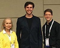 Committee chair Anna Nagurney, award recipient Aleksandr Kazachkov and ICS chair Cole Smith (l-r).