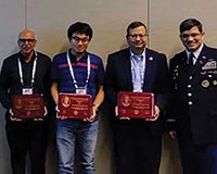 Rajan Batta, Yan Xia, Rakesh Nagi and Col. Andy Hall (MAS president) (l-r).
