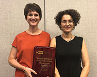 Award winner Beril Toktay and MSOM President Wedad Elmaghraby (l-r).