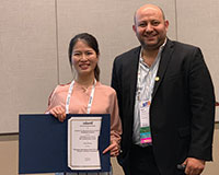 Award-winner Shan Wang with committee chair Aly Megahed (l-r).