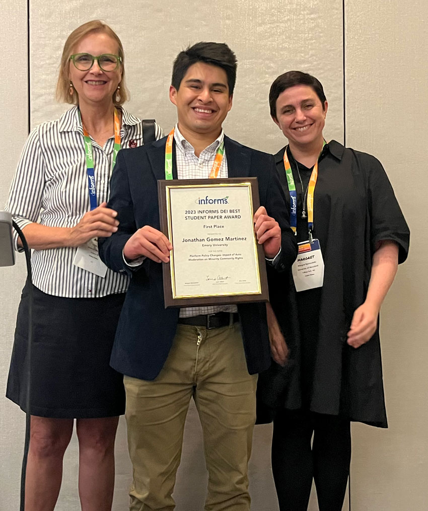 2023 INFORMS DEI Best Student Paper award winner flanked by committee members