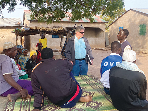 James Cochran meets with village leaders in rural western Gambia