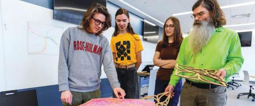 Al Holder with students in the classroom